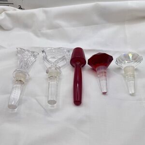 Towle Crystal  Wine Stoppers and 2 signed Oleg Cassini one red unsigned lot of 5
